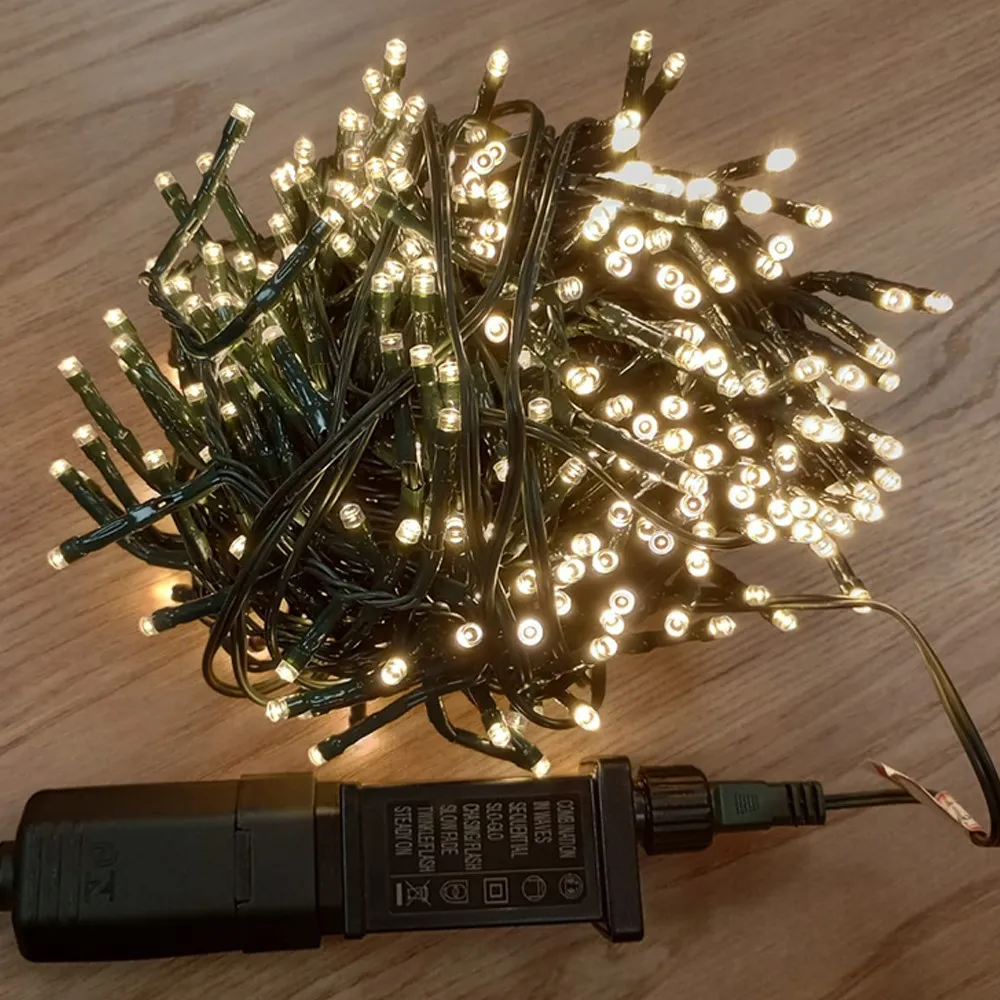 Pisca de Natal 500 LED 8 Funções com Memória Luz Branco Quente, Fio Verde Ø1,6 mm IP44 Uso Externo 50 Metros